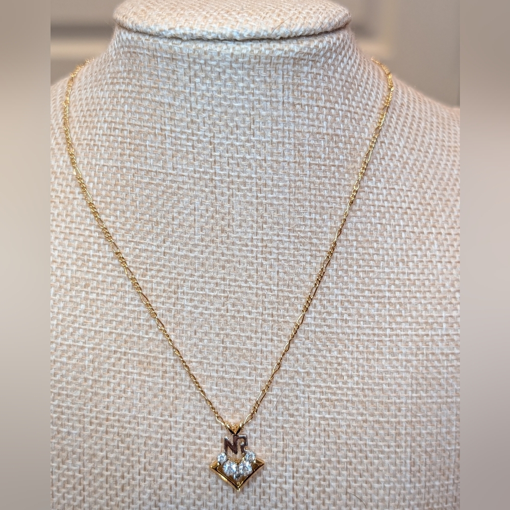 Nina Ricci Gold Tone Crystal Pendant Necklace